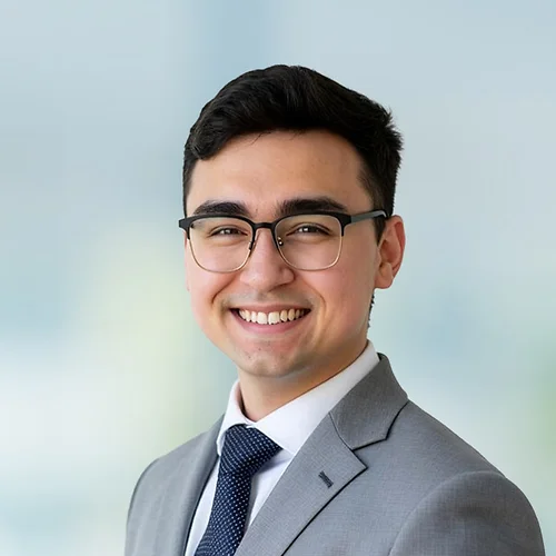 A photo of attorney Cameron Vahlkamp against a softly blurred office background