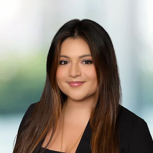 A photo of attorney Vanessa Cornejo against a softly blurred office background