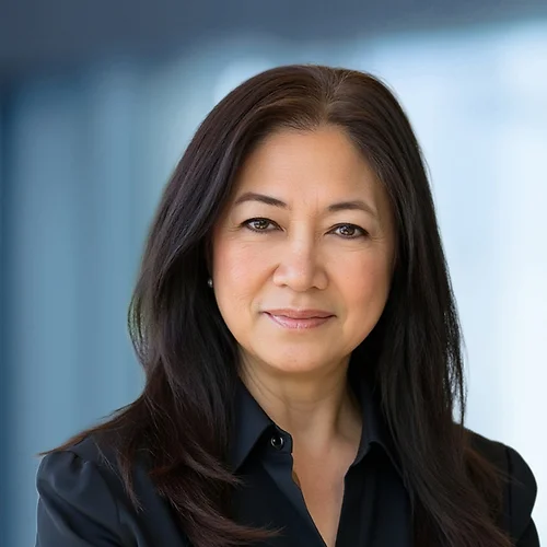 A photo of attorney, Angeli Aragon, against a softly blurred office background
