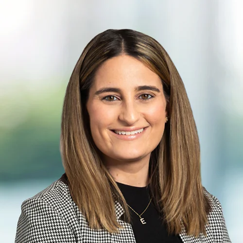 A photo of attorney, Andrea Rosenkranz, against a softly blurred office background