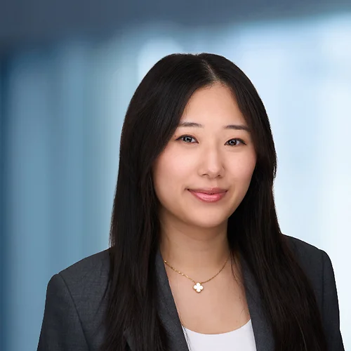 A photo of attorney Yuhan Jia against a softly blurred office background