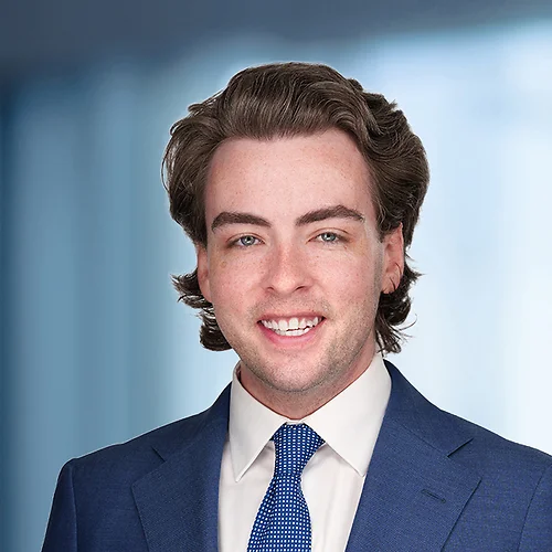A photo of attorney Jack O'Hollearn against a softly blurred office background