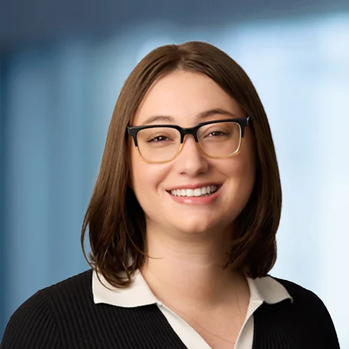 A photo of attorney Megan Bryant-Tiktin against a softly blurred office background