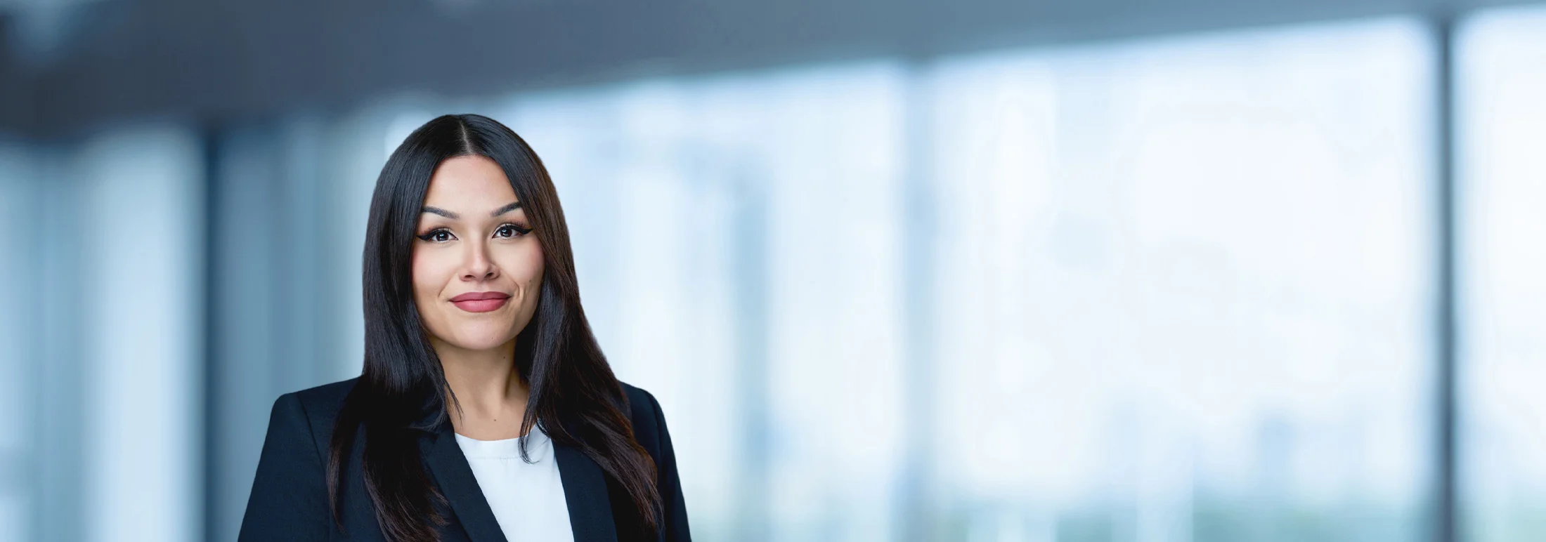A photo of attorney Kara White against a softly blurred office background