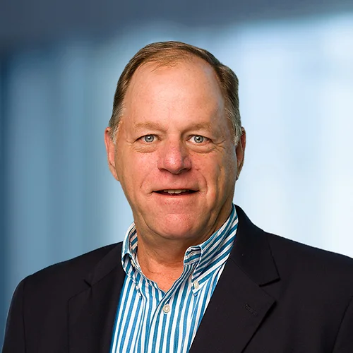 A photo of attorney Robert Yates against a softly blurred office background