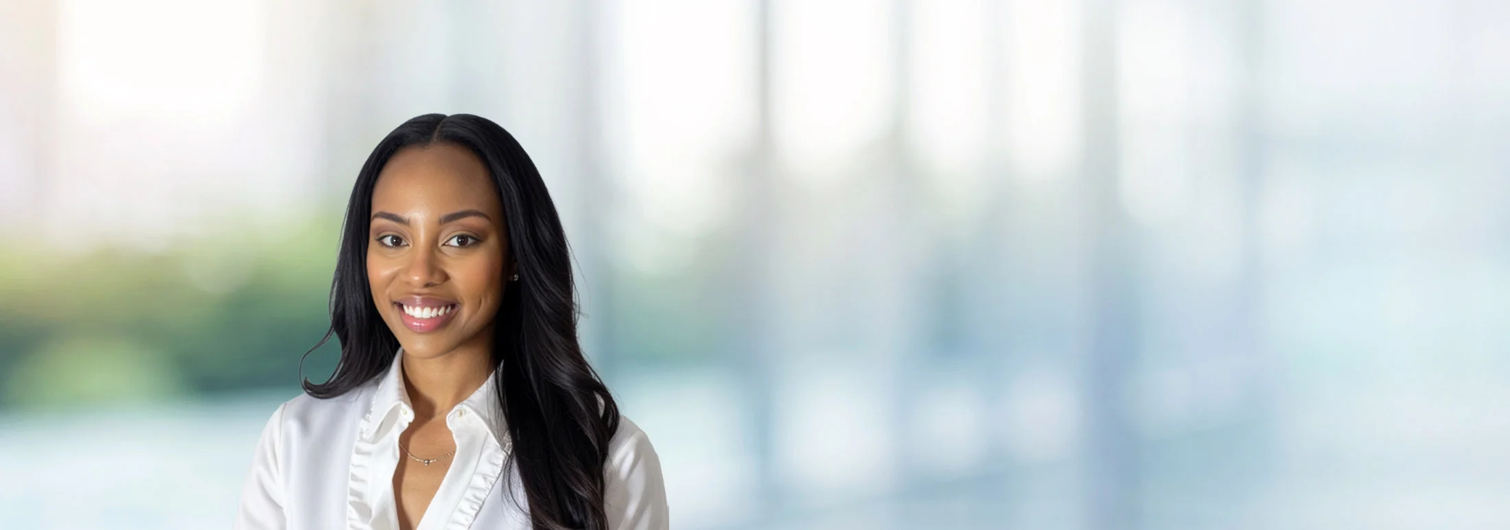 A photo of attorney Keyana Young against a softly blurred office background