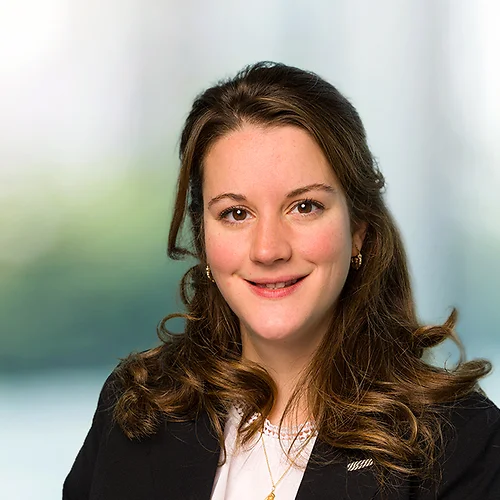 A photo of attorney, Colleen O'Dwyer, against a softly blurred office background.