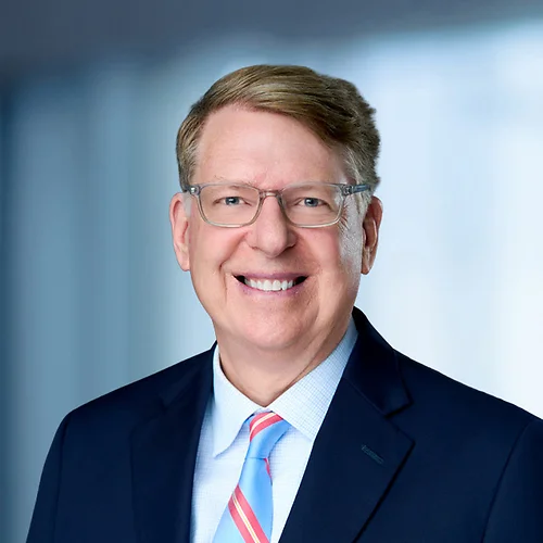 A photo of attorney, James Cosby, against a softly blurred office background