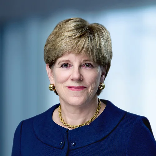 A photo of attorney Ann Reardon against a softly blurred office background