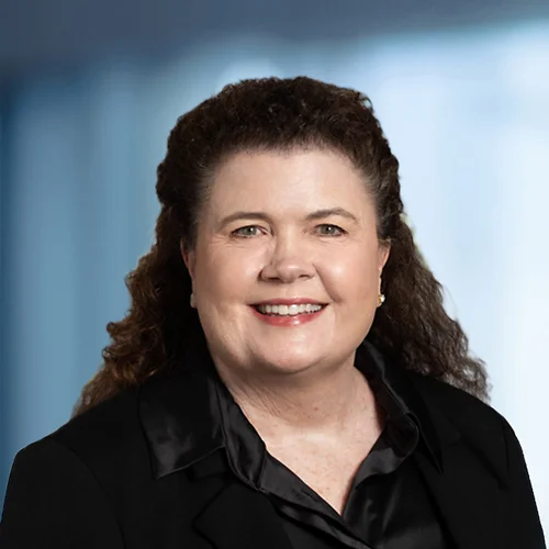A photo of attorney Jill Johnson against a softly blurred office background