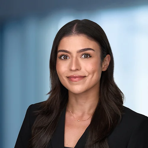 A photo of attorney Bianca Bonjean against a softly blurred office background